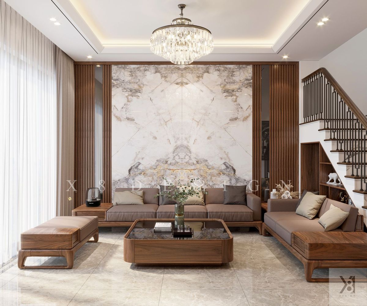 Phòng khách với vách đá vân mây và sofa gỗ Phòng khách nhà phố anh Châu nội thất tân cổ điển tông gỗ
